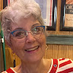 Photo of reviewer. Older lady with grey hair, red and white stripey t-shirt.